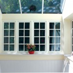 Elegant white casement windows with georgian bars