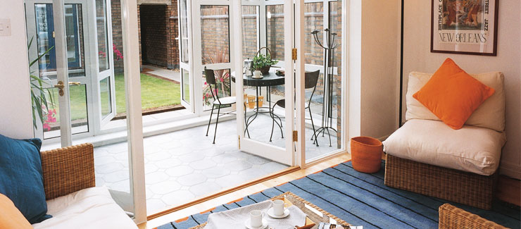 A relaxing conservatory area with dining table