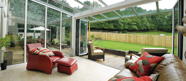 Conservatory opening onto decking and garden area