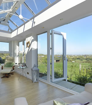 Modern orangery with french doors in modern white colour