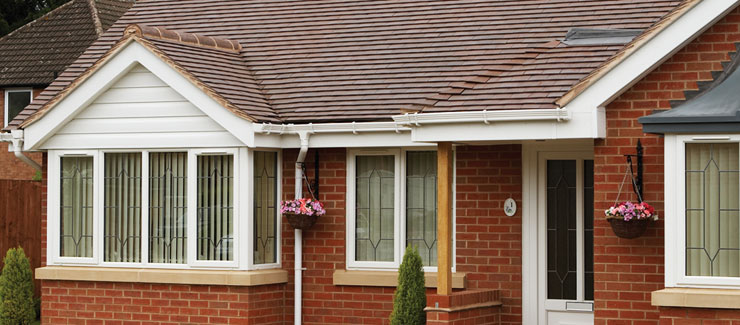 A house with white pvcu bargeboard and guttering