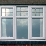White casement windows with lead detail