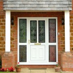 A white uPVC door with side panels