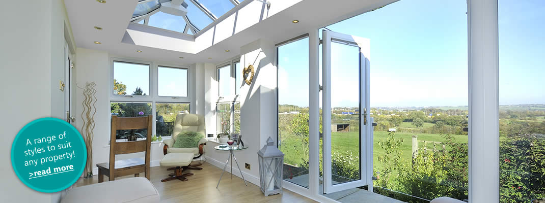 A large white orangery used as living room